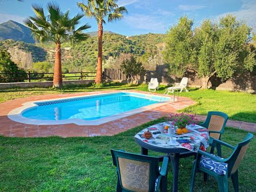 Zahara de la Sierra House | Cozy Rural Retreat with Pool and Ocean View in Zahara