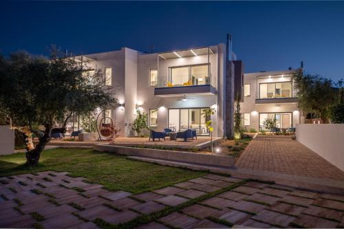 Petalidi Apartment | Discover VUAR SUITES: 4-Star Stay with Pool & Family-Friendly Amenities
