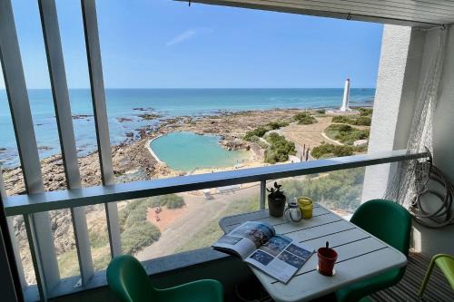 Les Sables d'Olonne Apartment | Oceanfront Retreat with Natural Pool and Breathtaking Views