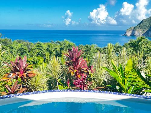 Deshaies Villa | Oceanfront Retreat: 3 Beds, Pool & Steps to the Beach