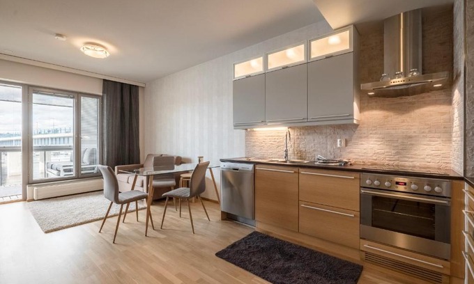 Ylamylly Apartment | Elegant Joensuu Tähdenloiste: 5-Star Comfort Awaits