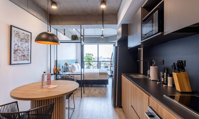 Barrios Unidos Apartment | Discover a Unique Loft in Virrey - Pet Friendly & Accessible