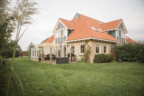Ameland House | Discover Waddenvilla 18: Family and Pet-Friendly Retreat