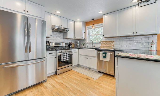 Rogers City Cottage | Walk to Lake Huron Beaches: Home w/Fire Pit!
