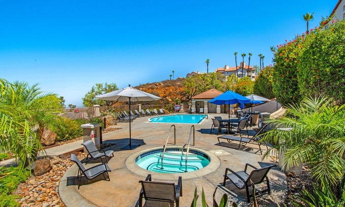 Miramar Ranch North Condo | Dog-Friendly Retreat Steps from the Lake with Pool & Spa