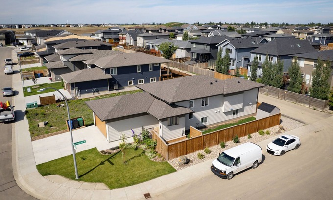 Lethbridge House | Walkout full separate 2BR 1Bath 3 queen beds suite. Separate entrance. Laundry.