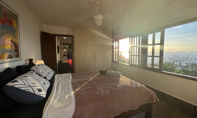 Leblon Apartment | Ocean View Retreat: Steps to the Beach & Pet Friendly