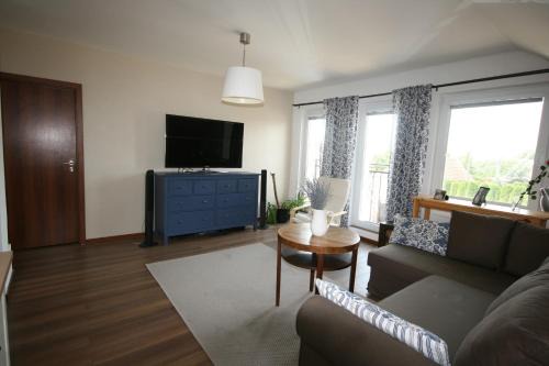 Tovarniky House | Cozy Walnut Apartment with Sauna and Scenic Pond Retreat
