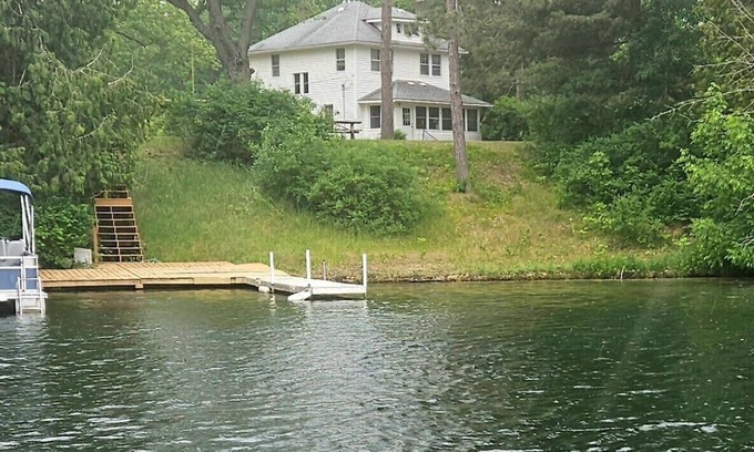 Mesick House | Cozy Waterfront Retreat: 100-Year-Old House with Dock