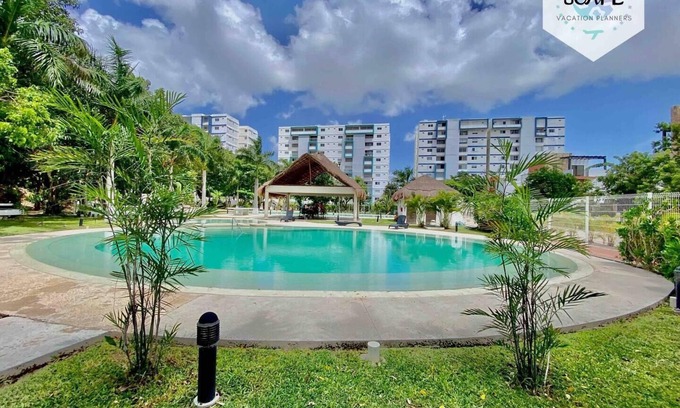 Jacinto Pat Apartment | Inviting Apartment with Pool in a Serene Residential Area