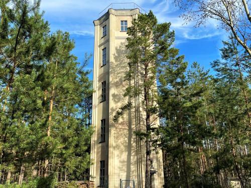 Spreetal House | Inviting Wasserturm Spreewitz with Cozy Fireplace & Hot Tub