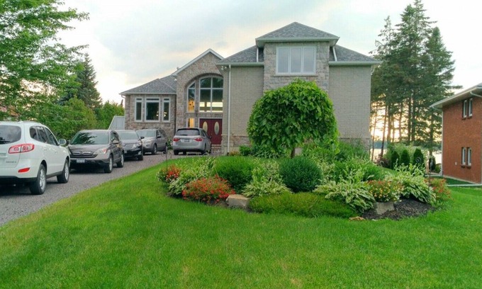 Janetville House | Scenic Waterfront Lake House with Pool & Family Amenities