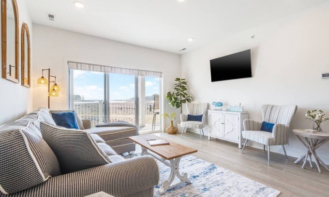 Rehoboth Beach Condo | Scenic Water Views & Chef's Kitchen with Inviting Patio