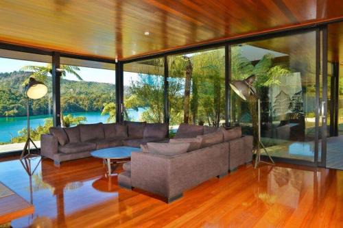 Saint Omer House | Discover Waterfall Bay Glass House: 4-Star Ocean Retreat