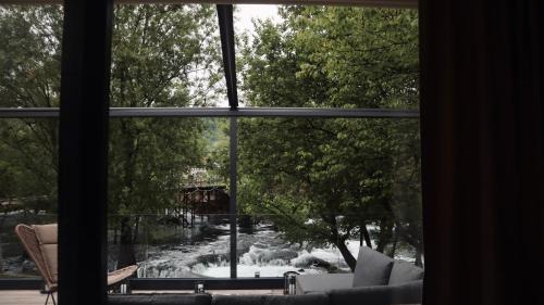 Bihac House | Eco-Friendly Waterfall Glamping Cabin with Ocean Views
