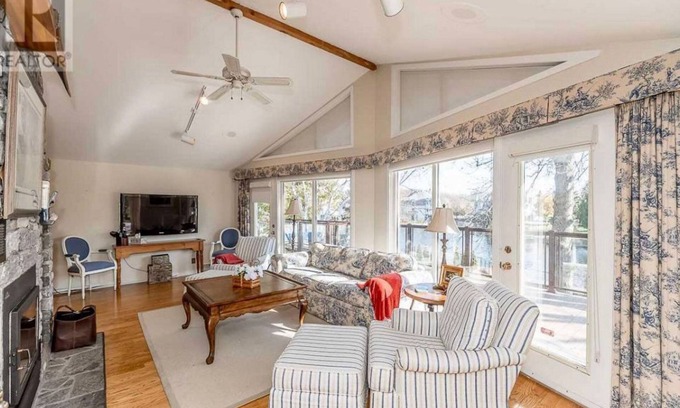 Lagoon City Villa | Elegant Waterfront Cottage: 4 BD, Pool & Spa Amenities