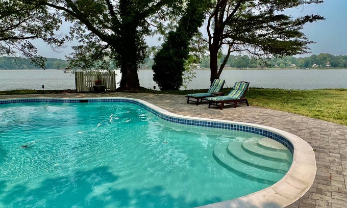 Easton House | Waterfront Oasis: Dock, Pool & Top-Rated Amenities Await