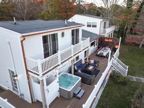 South Dennis House | Waterfront Retreat with Hot Tub, Pet Friendly & Firepit