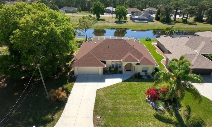 White Marsh House | Unmatched Waterfront Haven with Pool and Spa Amenities