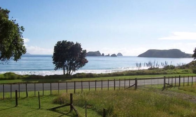 Opito Bay House | Waterfront Holiday Home: Family-Friendly Retreat with Pool