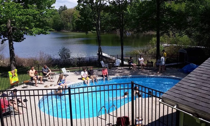 Interlochen House | Tranquil Waterfront Retreat in Lake Ann with Pool & Pets