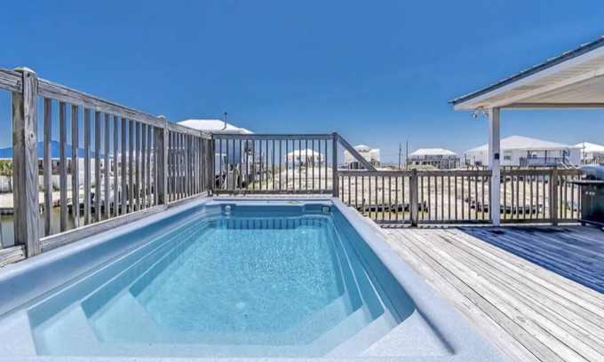 Silver Cay House | Waterfront home with a private pool spa and Gulf views