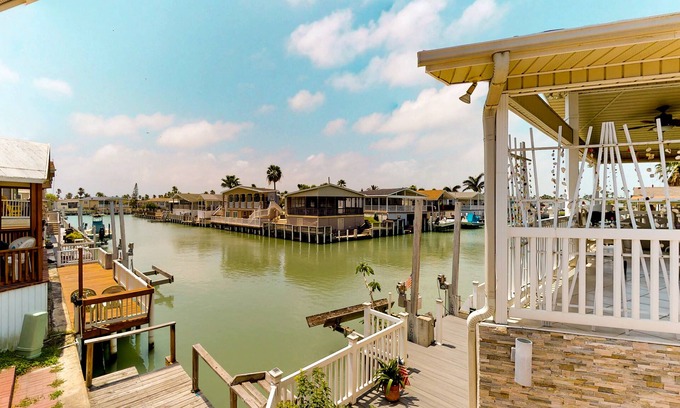 Port Isabel House | Inviting Waterfront Home with Private Dock and Shared Pools