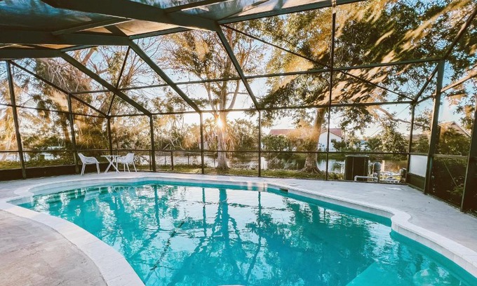 Iona House | Tranquil Waterfront Retreat with Pool near Sanibel Island
