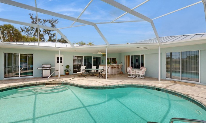 Sorrento Shores House | Waterfront home with pool, dock accessible to Gulf, dog friendly with AC & WD