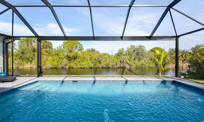 Port Charlotte House | Waterfront Key West Style Home with Private Heated Pool