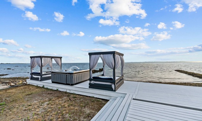 Fairhaven House | Scenic Waterfront Oasis with Day Beds and Hot Tub