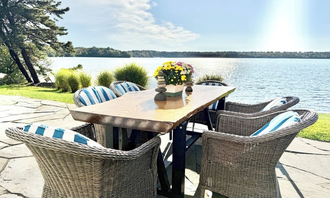 Brewster House | Idyllic Waterfront Retreat with Private Beach & Bikes