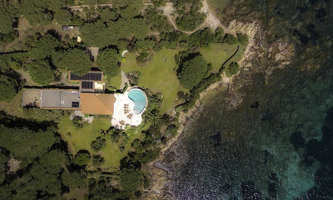 San Teodoro Villa | Scenic Waterfront Retreat with Beach Access and Ocean Views