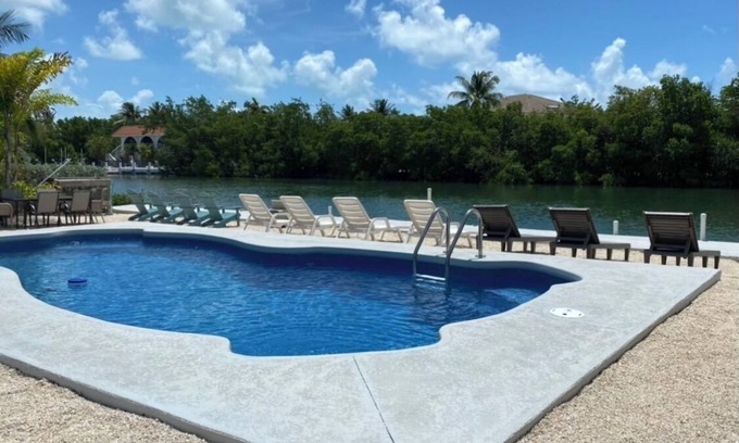 Marathon House | Waterfront Private Home: 7 BR, Pool & Ocean Views Await