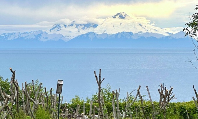 Happy Valley House | Waterfront retreat with stunning views of Iliamna Volcano: The View - Full House