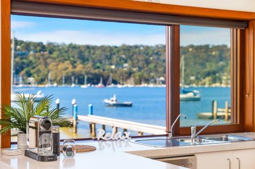 Scotland Island House | Cozy Waterfront Island Retreat: Pet-Friendly with Ocean Views