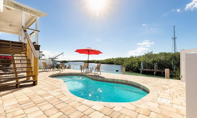 Marathon House | Private Waterfront Retreat with Heated Pool and Dock Access