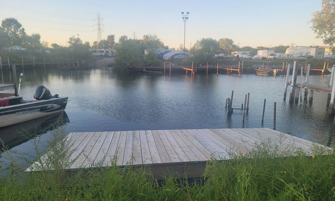 Wyandotte House | Waterfront with boat dock 3-bedroom house on Detroit River canal. Good for 8