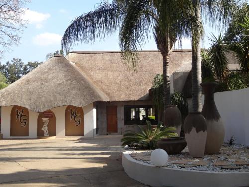 Rustenburg Cabin | Discover Waterglen Guest Lodge: Poolside Family Retreat