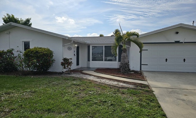 Lochmoor Waterway Estates House | Waterside 4 Bedroom Home with Pool and Spa Amenities