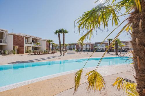 Jesolo Apartment | Wave Island Pop L3: Family-Friendly Stay with Pool Access