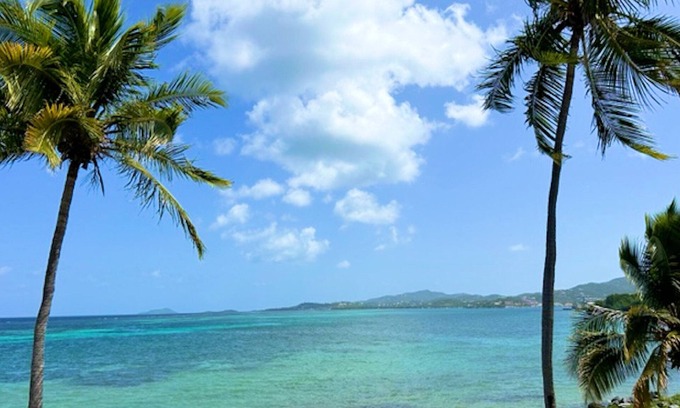 Estate Golden Rock Condo | WE SHELL SEA - 2 bed/2 bath beachfront condo- beach and pool.