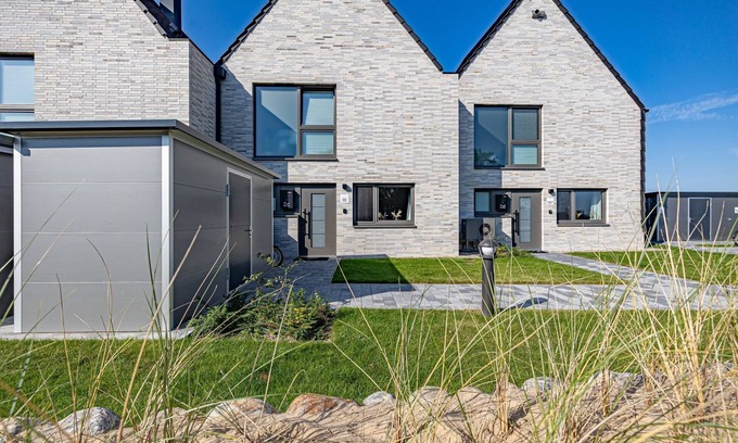 Busum House | Wehlen-koje: Cozy Getaway with Sauna and Ocean Views
