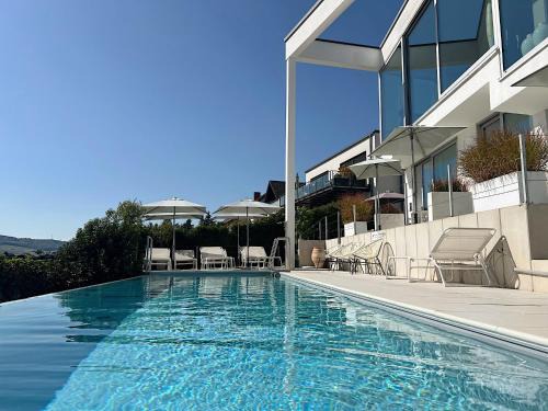 Mehring Hotel | Experience Weingut-Aparthotel Olinger: Oceanfront Bliss