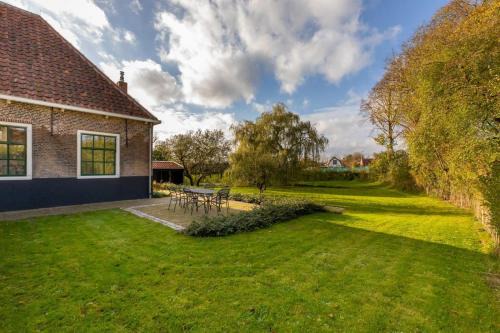 Heinkenszand House | Welcome in - Vakantiehuis Boerderij Molenhof met een riante tuin en rustig gelegen
