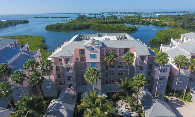 Placida Condo | Experience Boca Breeze: Spectacular Harbor Views Await!