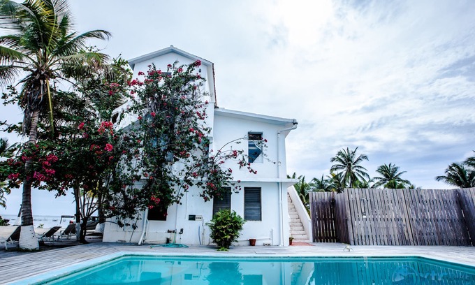Xcalak Hotel | Discover the Flying Cloud Beach Hotel: Oceanfront Relaxation