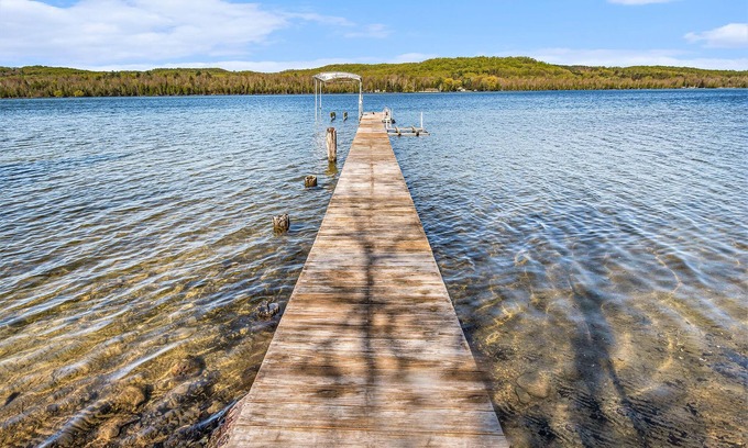 Bellaire Cottage | Explore Loon Lodge: Lakefront Oasis with Ocean Views
