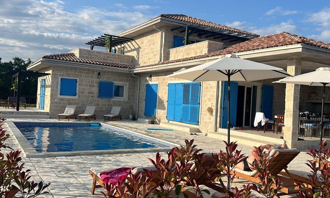 Prkacini Villa | Discover Villa Mare Blue: Ocean View & Poolside Retreat