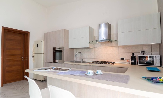 Nurachi Apartment | Discover Welcomely - Family-Friendly Mameli Apartment
